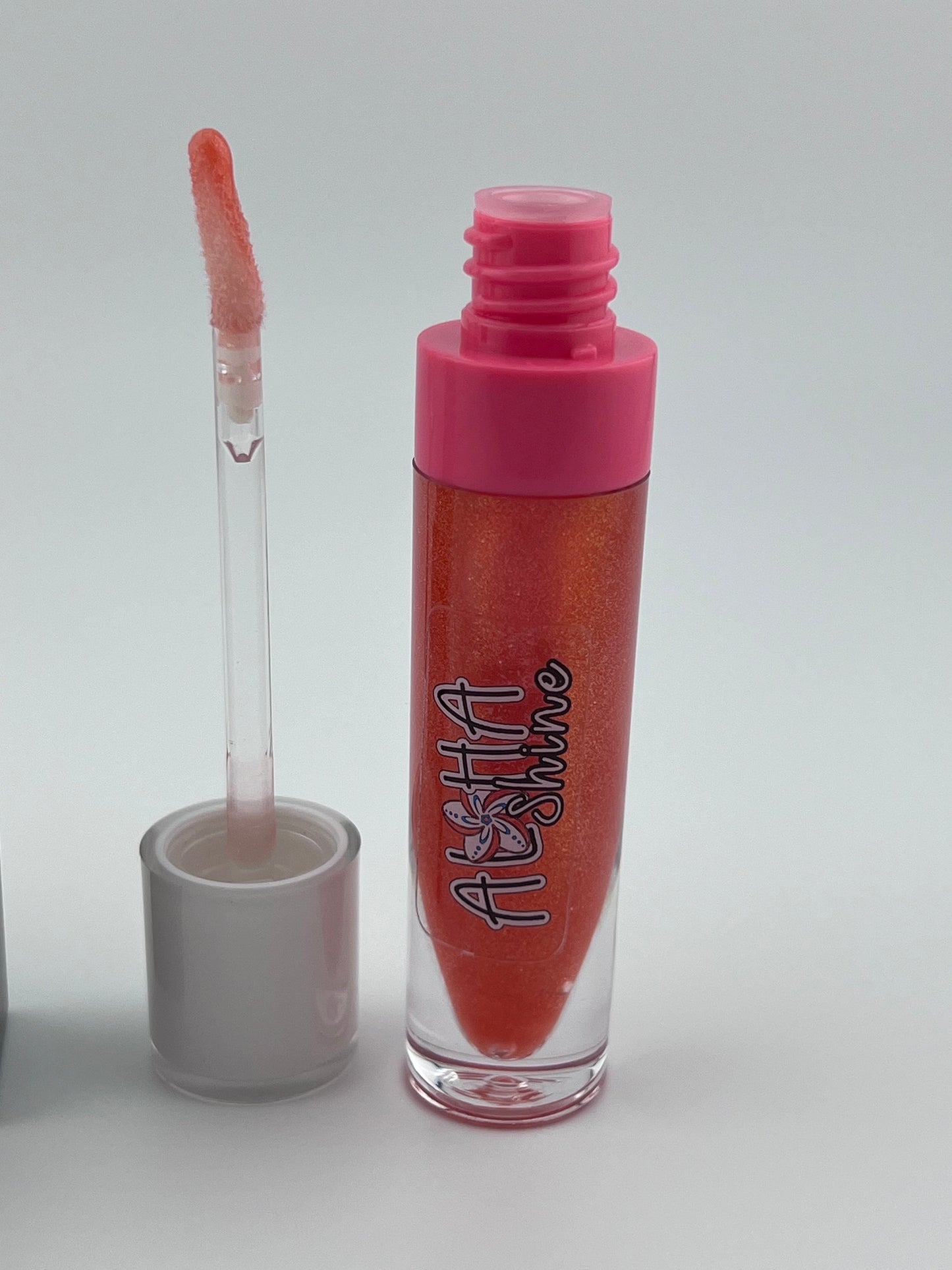 Candy Cane Swirl- Candy Cane flavored- Glossy shine with red and pink swirls