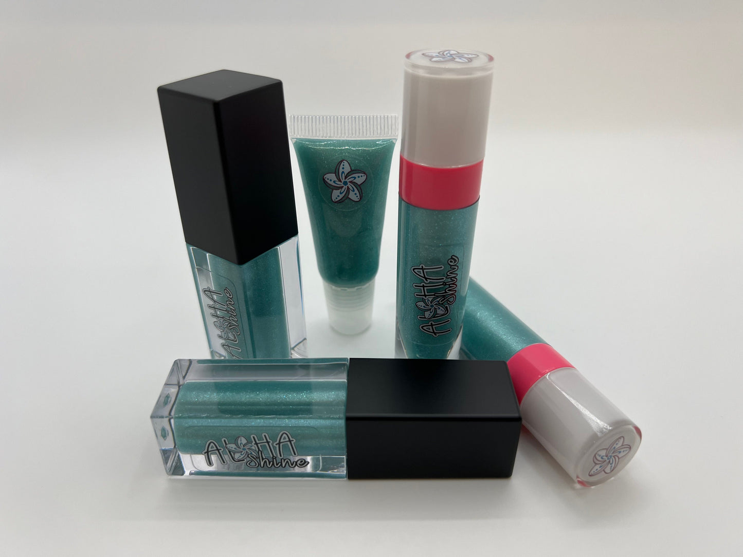 Coral Reef - Blue Raspberry Cotton Candy Flavored Lip Gloss with Teal Shimmer