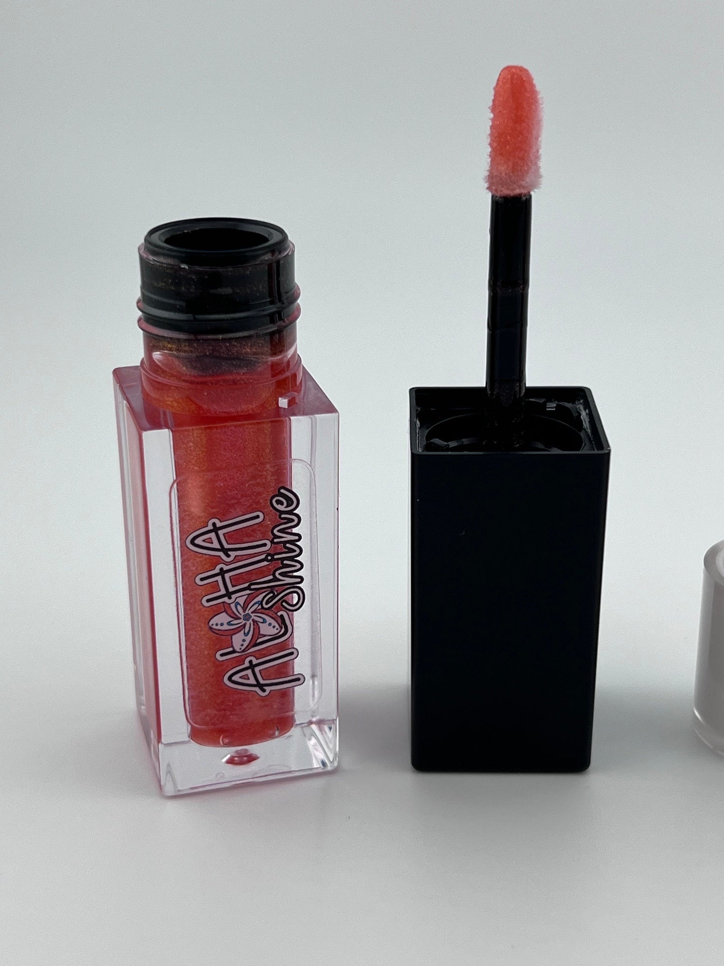 Candy Cane Swirl- Candy Cane flavored- Glossy shine with red and pink swirls